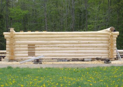handcrafted log home under construction